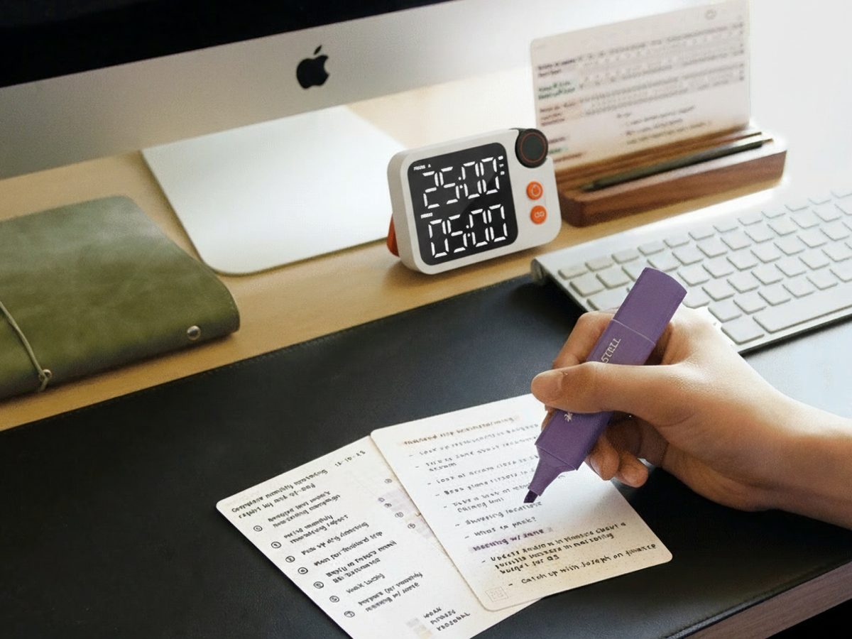 A highlighter shading the time grid on a card, with the Flow Timer behind it